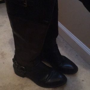 Brown and black knee high boots